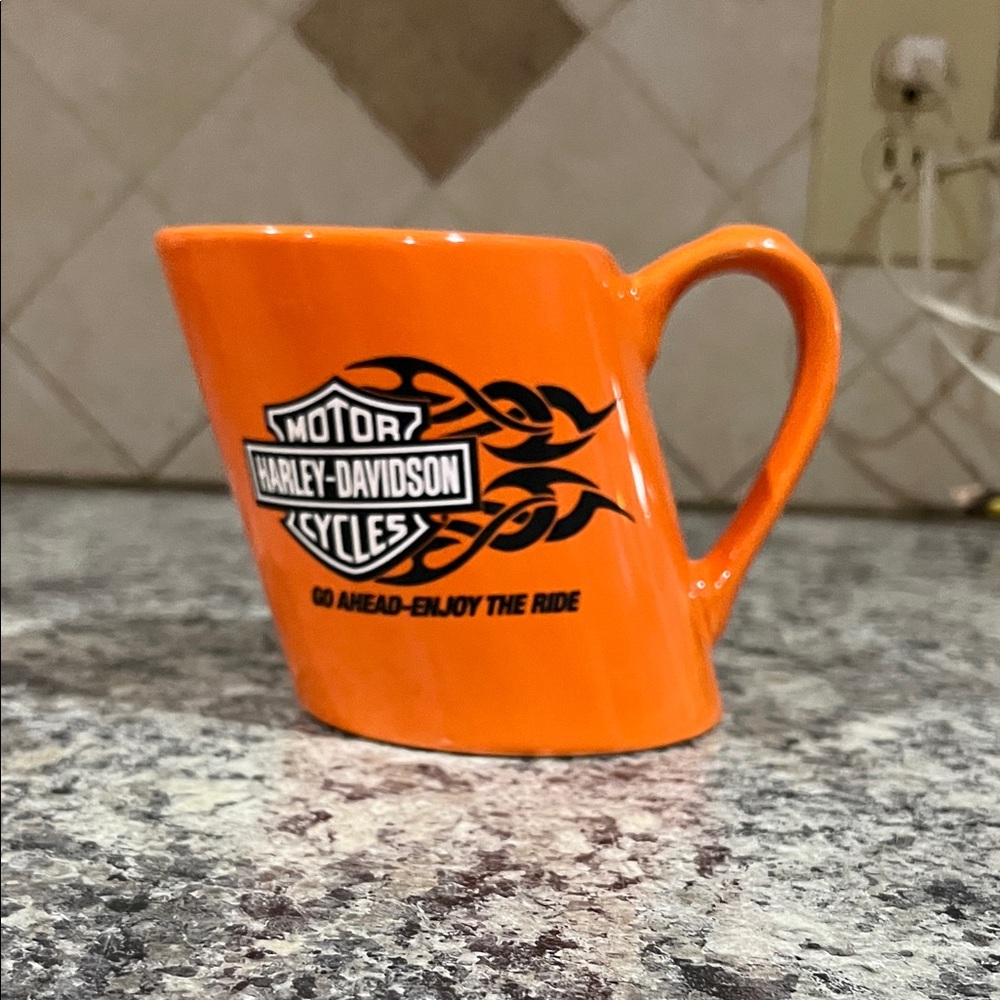 Harley-Davidson Bold Orange Mug on a slant.